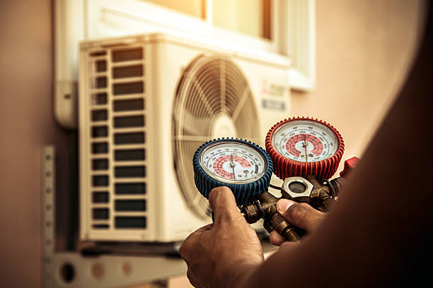 Professional Ductwork Repair technician working in Peoria, IL
